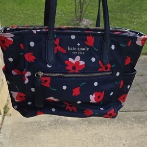 kate spade navy tote with red and pink floral print
